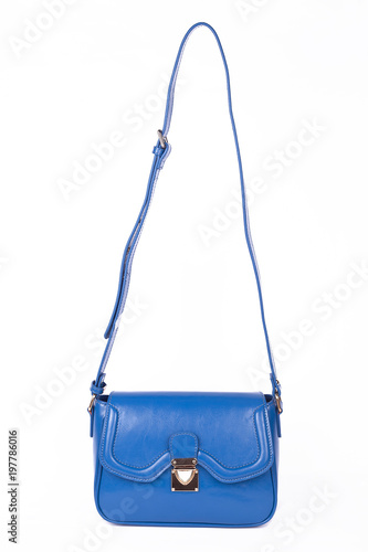 Obraz na płótnie Blue Women's handbag, Ladies bag,Blue female clutch,Blue clutch.Women's bag isolated white background.Bag isolated white background.Clutch isolated white background. w salonie