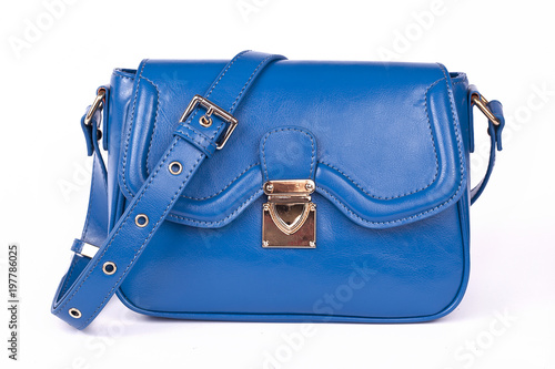 Obraz na płótnie Blue Women's handbag, Ladies bag,Blue female clutch,Blue clutch.Women's bag isolated white background.Bag isolated white background.Clutch isolated white background. w salonie