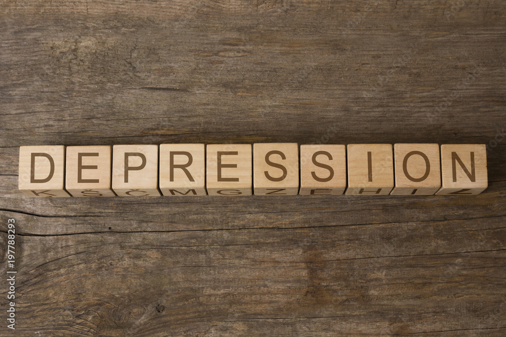 word DEPRESSION written on wooden cubes