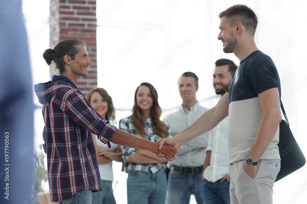 closeup of handshake of business partners closeup of handshake of business partners