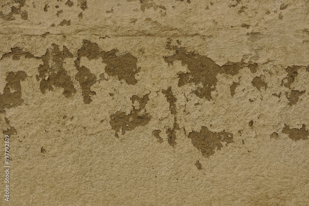 brown texture of an old grated concrete wall