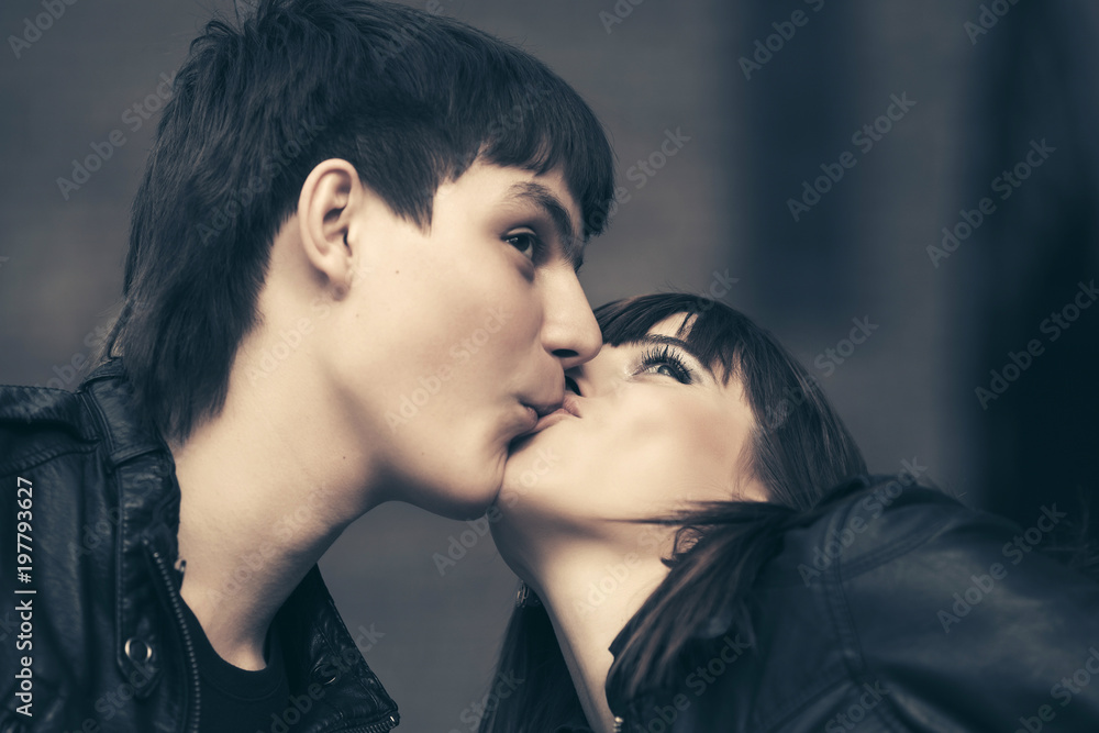Happy young couple in love kissing outdoor Happy young couple in love kissing outdoor