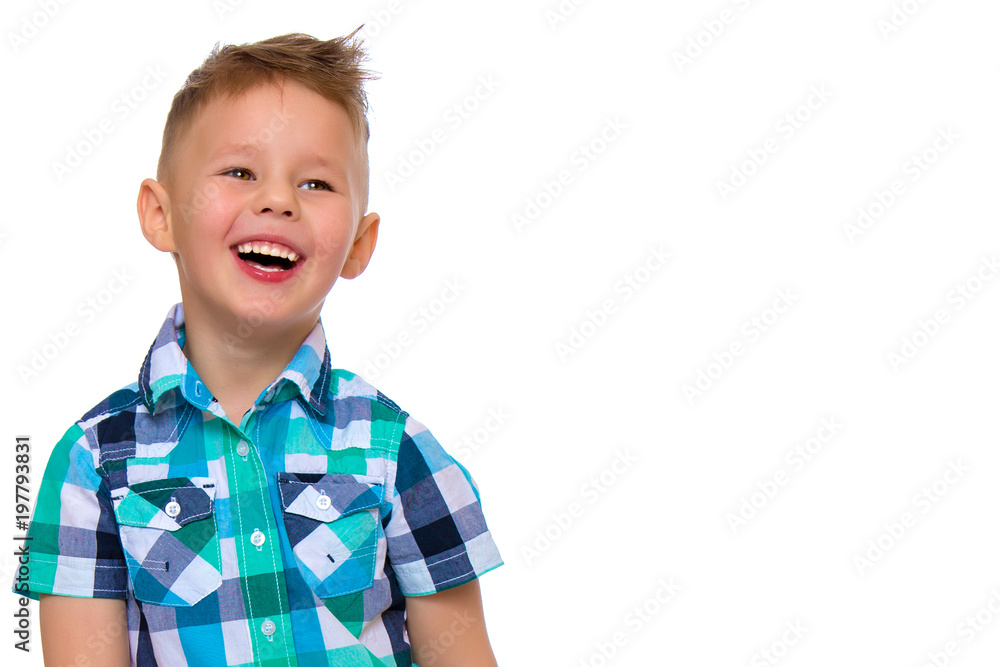 Handsome little boy laughing.
