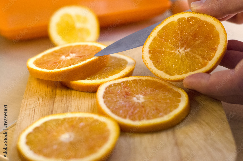 Fototapeta premium Oranges sliced on the table