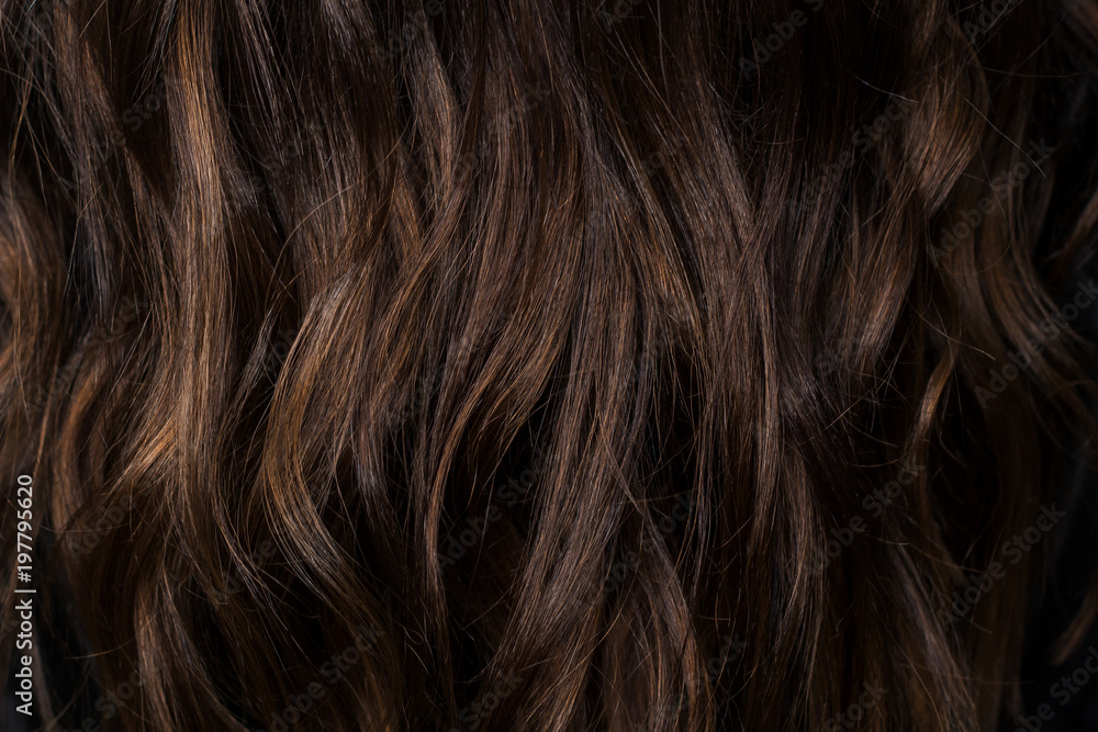 Beautiful curvy dark brown hair with chocolate highlights. I photographed  in the beauty salon during the work of the stylist. Stunning texture and  wallpaper hair. Hair Background Stock Photo | Adobe Stock