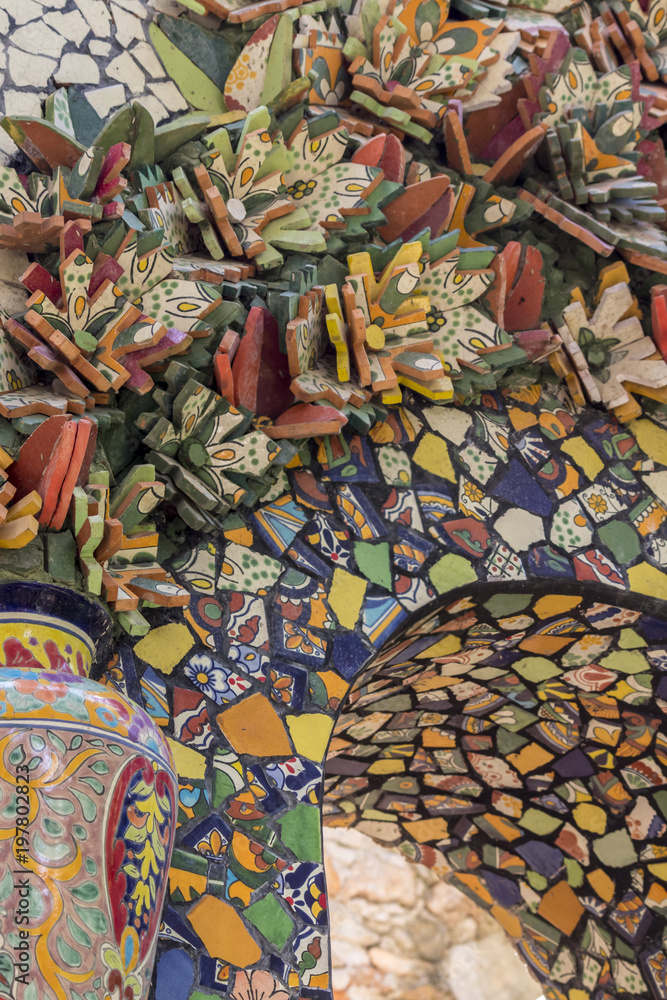 Mexican talavera style pottery used in altar and fountain. This colorful handmade maiolica have a blurred appearance as they fuse slightly into the glaze. Vibrant colors and unique designs in each one Mexican talavera style pottery used in altar and fountain. This colorful handmade maiolica have a blurred appearance as they fuse slightly into the glaze. Vibrant colors and unique designs in each one