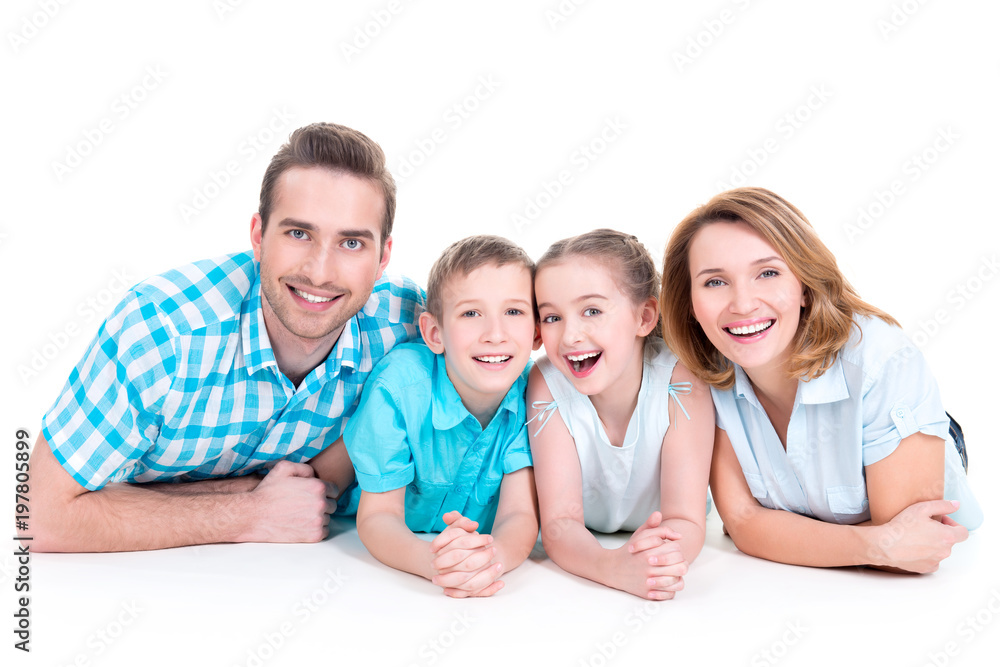Caucasian happy smiling young family with two children Caucasian happy smiling young family with two children