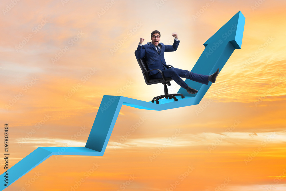Obraz premium Businessman in economic growth concept