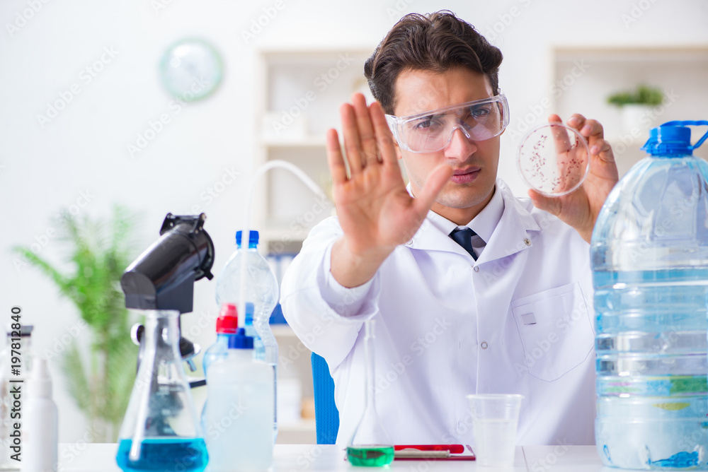 Fototapeta premium Lab assistant testing water quality