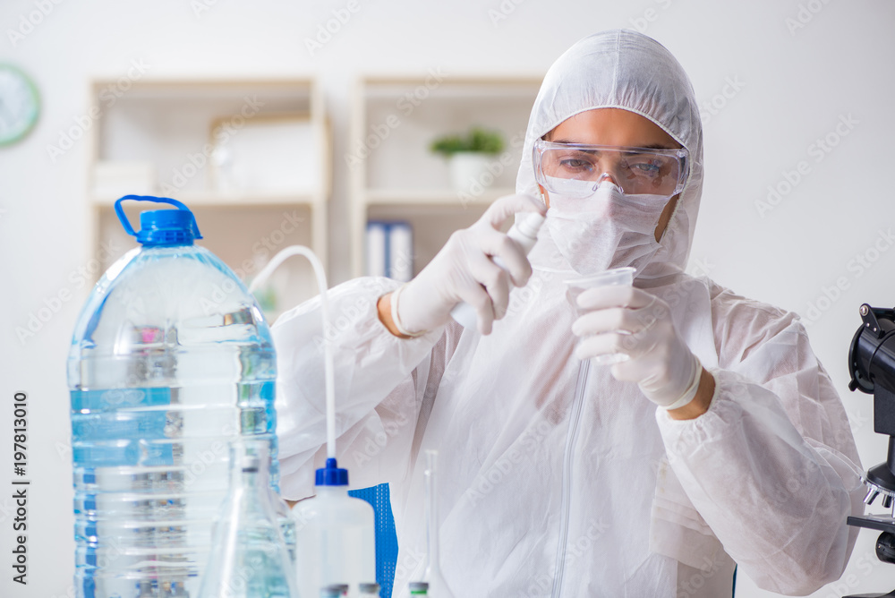 Lab assistant testing water quality Lab assistant testing water quality