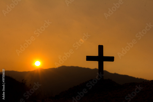 Crucifixion Of Jesus Christ., cross silhouette on the mountain at sunset