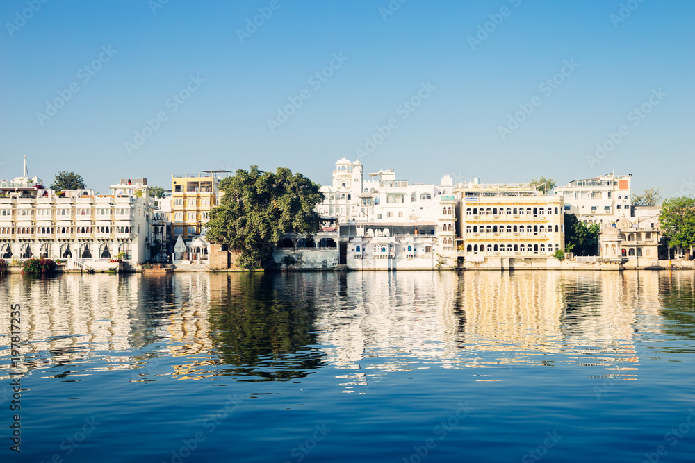 Pichola lake and old buildings in Udaipur, India