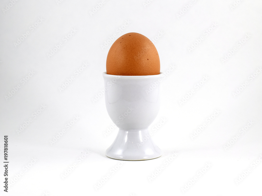 Egg cup with brown soft boiled egg Egg cup with brown soft boiled egg