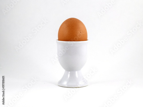 Egg cup with brown soft boiled egg