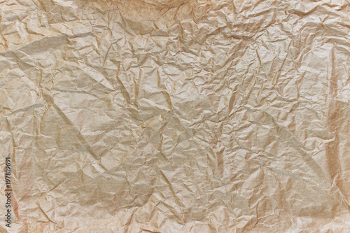 Texture of wrinkled, crumpled craft paper.