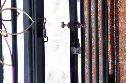 Iron open gate in the city of winter Park photo