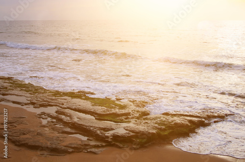 background of beach and sea at sunset colors.