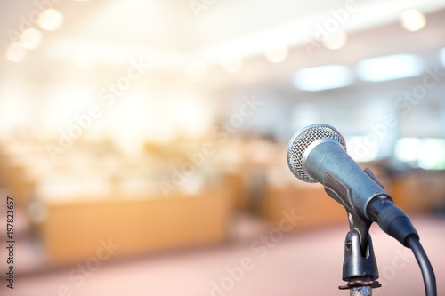 Microphone in conference on seminar room event background 