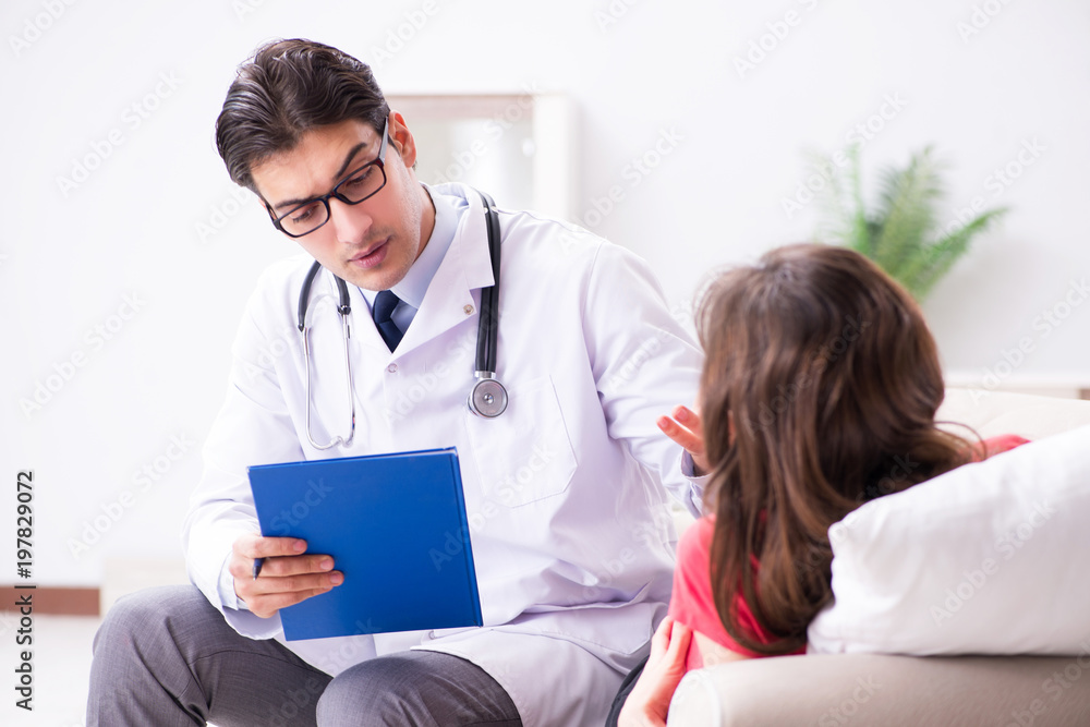 Pregnant woman patient visiting doctor for regular check-up Pregnant woman patient visiting doctor for regular check-up