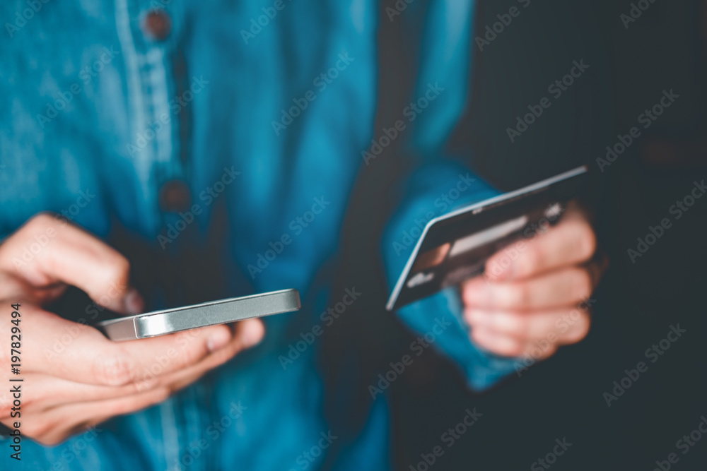 Online banking businessman using smartphone with credit card Fintech and Blockchain concept Online banking businessman using smartphone with credit card Fintech and Blockchain concept