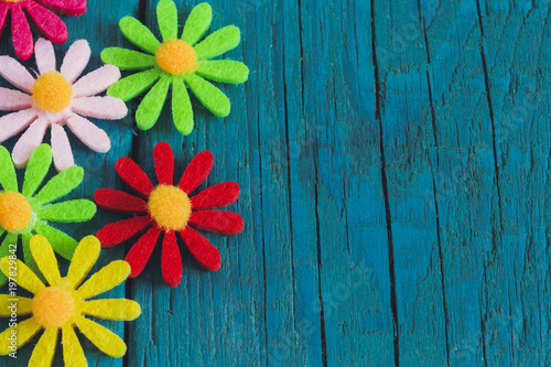 Easter Background with Flowers on Modern Wooden Board Texture