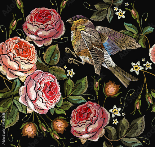 Roses and birds embroidery seamless pattern. Classical embroidery vintage buds of roses and titmouse on black background. Fashionable template for design of clothes, t-shirt design, tapestry flowers