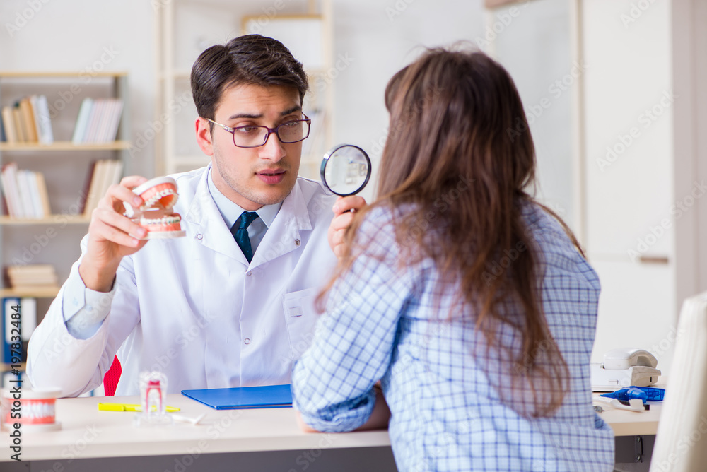 Fototapeta premium Patient visiting dentist doctor for preliminary appointment