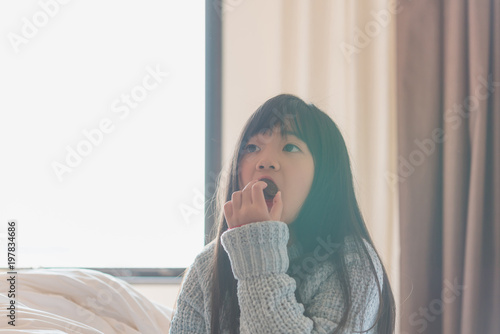 Cute asian girl in room