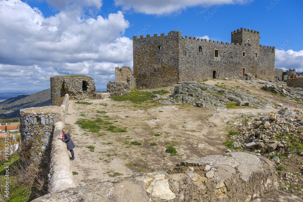 The ancient castle of montanchez, extremadura, spain, freely accessible to tourists, is situated on top of a mountain and offers a beautiful panoramic view of the landscape.