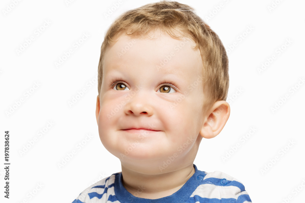 Cute little boy smiling, close-up, isolated