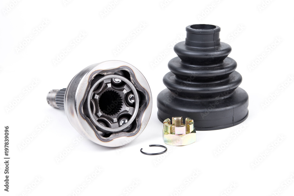 Constant velocity joint with boot and lock nut on white background.Auto parts kit Constant velocity joint with boot and lock nut on white background.Auto parts kit