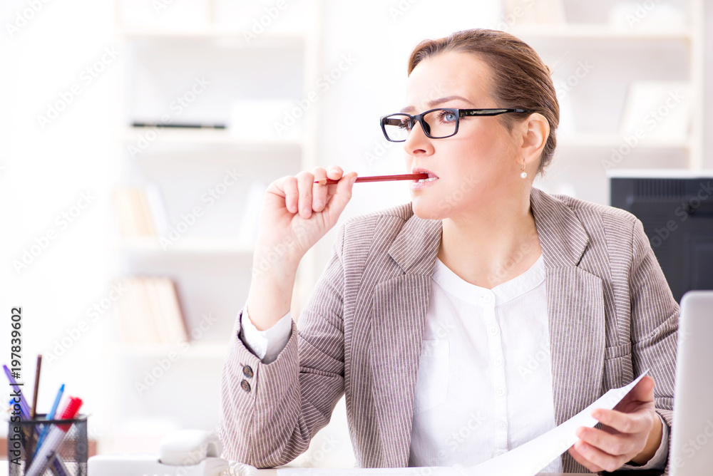 Businesswoman employee working in the office Businesswoman employee working in the office