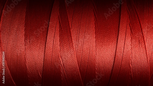Macro picture of red color thread texture
