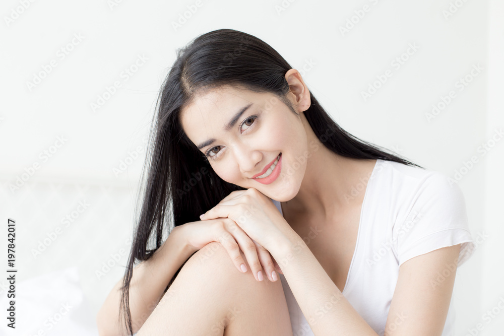 Portrait of beatiful asian woman looking to camera with attractive smiling. Portrait of beatiful asian woman looking to camera with attractive smiling.