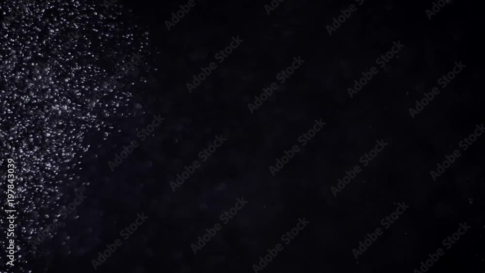 Slow moving real particles on black background. Slow moving real particles on black background.