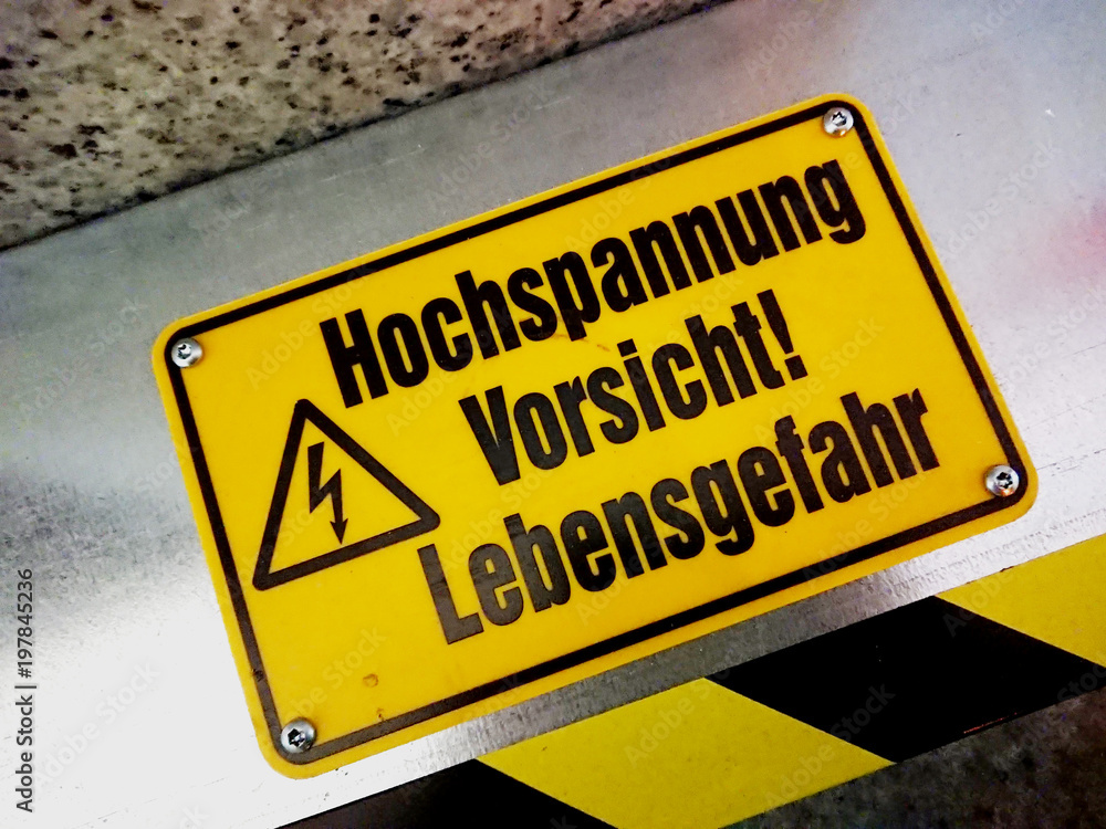 Warning sign Hochspannung Vorsicht! Lebensgefahr, German for: High voltage. Caution! Danger to life Warning sign Hochspannung Vorsicht! Lebensgefahr, German for: High voltage. Caution! Danger to life