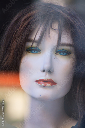 Mannequin in sunlight reflection