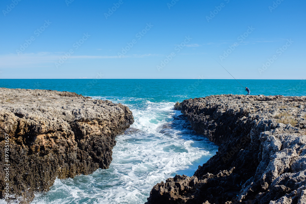 Inlet along the rocky coastline of Polignano. Apulia, Italy