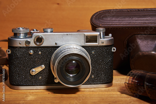 A film camera (analog camera) and a camera case made of leather that were made in the middle of the twentieth century