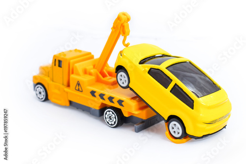 Toy trucks for kids towing vehicle yellow isolate on white background © Luis2499