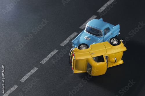 Traffic accident by toy cars. photo