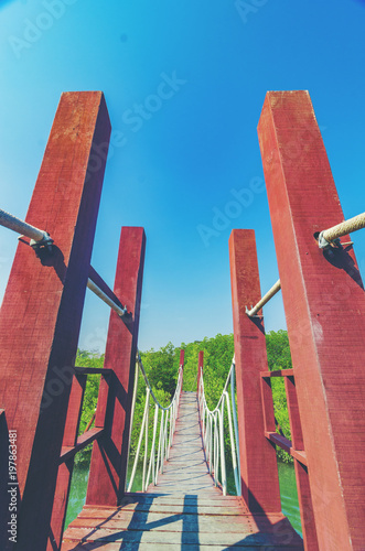 Wooden walking bridge in ma...