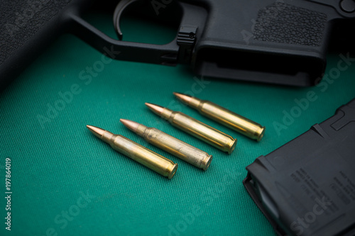 .ammo to machine gun and ammunitions photo