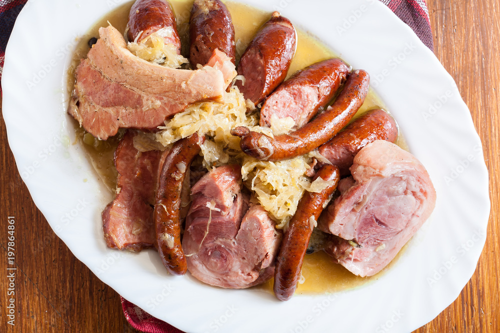 Choucroute garnie. Alsatian sauerkraut Choucroute garnie. Alsatian sauerkraut