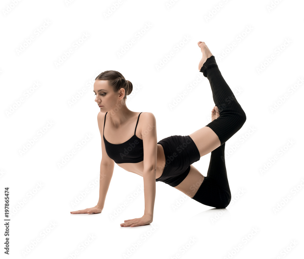 Girl in black sportswear doing fitness shot