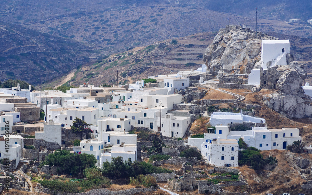 A view of some white houses of Chora of Amorgos, with the castle on the right