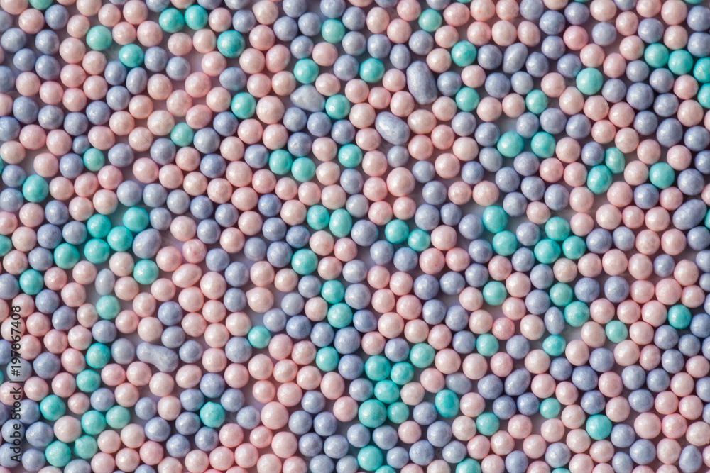Sugar sprinkle dots, decoration for confectionery. High magnification macro. Sugar sprinkle dots, decoration for confectionery. High magnification macro.