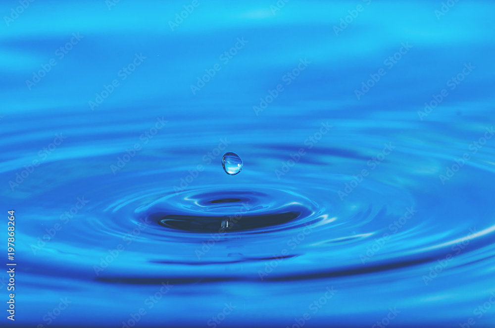 abstract background of Blue water drop falling down abstract background of Blue water drop falling down