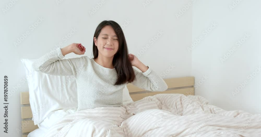 Woman wake up in the morning on bed Woman wake up in the morning on bed