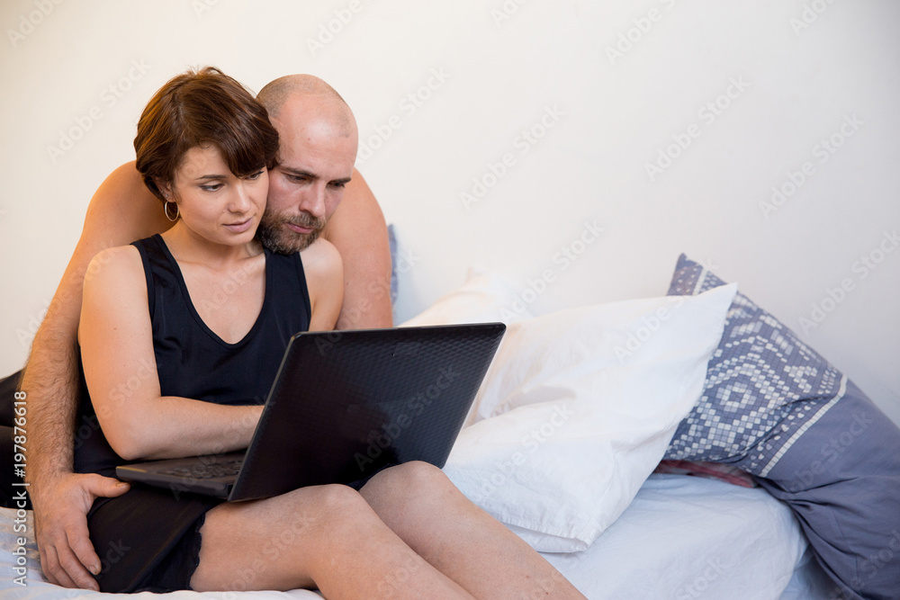 Couple spending time in bed Couple spending time in bed